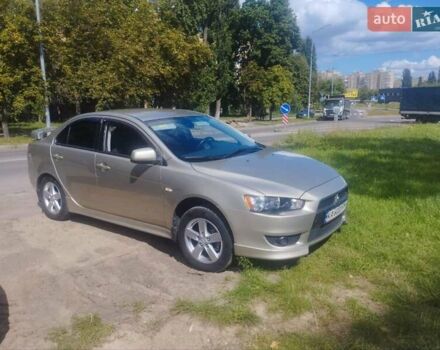 Бежевий Міцубісі Lancer, об'ємом двигуна 2 л та пробігом 100 тис. км за 8000 $, фото 1 на Automoto.ua