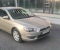 Бежевий Міцубісі Lancer, об'ємом двигуна 1.5 л та пробігом 145 тис. км за 7100 $, фото 1 на Automoto.ua