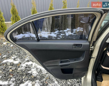 Бежевий Міцубісі Lancer, об'ємом двигуна 1.5 л та пробігом 245 тис. км за 6499 $, фото 15 на Automoto.ua