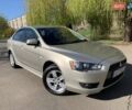 Бежевий Міцубісі Lancer, об'ємом двигуна 2 л та пробігом 175 тис. км за 7650 $, фото 9 на Automoto.ua