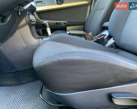Бежевий Міцубісі Lancer, об'ємом двигуна 2 л та пробігом 175 тис. км за 7650 $, фото 22 на Automoto.ua