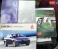 Бежевий Міцубісі Lancer, об'ємом двигуна 2 л та пробігом 100 тис. км за 8000 $, фото 7 на Automoto.ua