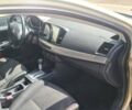 Бежевий Міцубісі Lancer, об'ємом двигуна 1.5 л та пробігом 145 тис. км за 7100 $, фото 2 на Automoto.ua