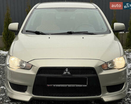 Бежевий Міцубісі Lancer, об'ємом двигуна 1.5 л та пробігом 245 тис. км за 6499 $, фото 1 на Automoto.ua