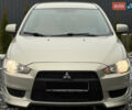 Бежевий Міцубісі Lancer, об'ємом двигуна 1.5 л та пробігом 245 тис. км за 6499 $, фото 1 на Automoto.ua
