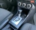 Бежевий Міцубісі Lancer, об'ємом двигуна 2 л та пробігом 175 тис. км за 7650 $, фото 32 на Automoto.ua
