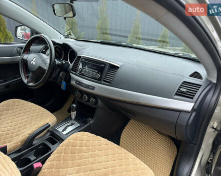 Бежевий Міцубісі Lancer, об'ємом двигуна 1.5 л та пробігом 245 тис. км за 6499 $, фото 13 на Automoto.ua
