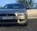 Бежевый Мицубиси Лансер, объемом двигателя 1.5 л и пробегом 214 тыс. км за 2000 $, фото 1 на Automoto.ua