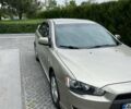 Бежевий Міцубісі Lancer, об'ємом двигуна 2 л та пробігом 181 тис. км за 7700 $, фото 1 на Automoto.ua