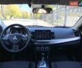 Бежевий Міцубісі Lancer, об'ємом двигуна 2 л та пробігом 175 тис. км за 7650 $, фото 33 на Automoto.ua