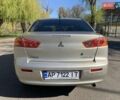 Бежевий Міцубісі Lancer, об'ємом двигуна 2 л та пробігом 175 тис. км за 7650 $, фото 6 на Automoto.ua