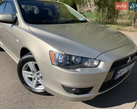 Бежевий Міцубісі Lancer, об'ємом двигуна 2 л та пробігом 175 тис. км за 7650 $, фото 16 на Automoto.ua
