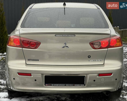 Бежевий Міцубісі Lancer, об'ємом двигуна 1.5 л та пробігом 245 тис. км за 6499 $, фото 4 на Automoto.ua