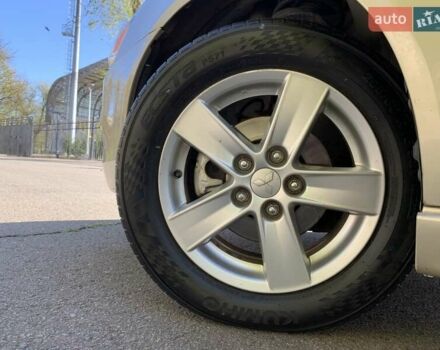 Бежевий Міцубісі Lancer, об'ємом двигуна 2 л та пробігом 175 тис. км за 7650 $, фото 15 на Automoto.ua
