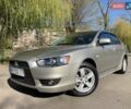 Бежевий Міцубісі Lancer, об'ємом двигуна 2 л та пробігом 175 тис. км за 7650 $, фото 11 на Automoto.ua