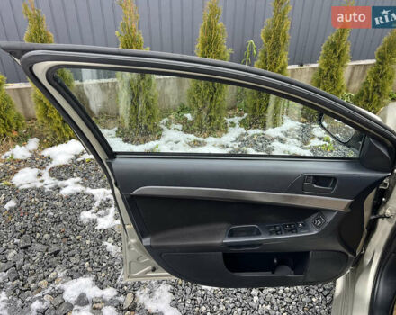 Бежевий Міцубісі Lancer, об'ємом двигуна 1.5 л та пробігом 245 тис. км за 6499 $, фото 14 на Automoto.ua