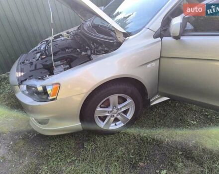 Бежевий Міцубісі Lancer, об'ємом двигуна 2 л та пробігом 100 тис. км за 8000 $, фото 2 на Automoto.ua