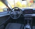Бежевий Міцубісі Lancer, об'ємом двигуна 2 л та пробігом 175 тис. км за 7650 $, фото 34 на Automoto.ua
