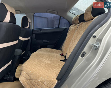 Бежевий Міцубісі Lancer, об'ємом двигуна 1.5 л та пробігом 245 тис. км за 6499 $, фото 7 на Automoto.ua