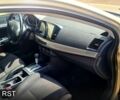 Бежевый Мицубиси Лансер, объемом двигателя 1.5 л и пробегом 145 тыс. км за 7100 $, фото 2 на Automoto.ua