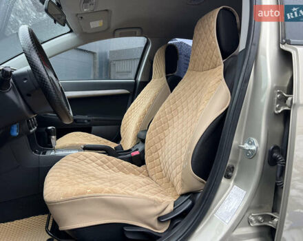 Бежевий Міцубісі Lancer, об'ємом двигуна 1.5 л та пробігом 245 тис. км за 6499 $, фото 6 на Automoto.ua