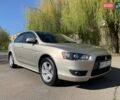 Бежевий Міцубісі Lancer, об'ємом двигуна 2 л та пробігом 175 тис. км за 7650 $, фото 3 на Automoto.ua
