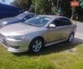 Бежевий Міцубісі Lancer, об'ємом двигуна 2 л та пробігом 100 тис. км за 8000 $, фото 1 на Automoto.ua