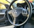 Бежевий Міцубісі Lancer, об'ємом двигуна 2 л та пробігом 175 тис. км за 7650 $, фото 25 на Automoto.ua