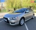 Бежевий Міцубісі Lancer, об'ємом двигуна 2 л та пробігом 175 тис. км за 7650 $, фото 17 на Automoto.ua