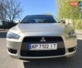 Бежевий Міцубісі Lancer, об'ємом двигуна 2 л та пробігом 175 тис. км за 7650 $, фото 2 на Automoto.ua