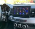 Бежевий Міцубісі Lancer, об'ємом двигуна 2 л та пробігом 175 тис. км за 7650 $, фото 26 на Automoto.ua