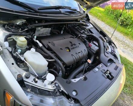 Бежевий Міцубісі Lancer, об'ємом двигуна 2 л та пробігом 100 тис. км за 8000 $, фото 3 на Automoto.ua