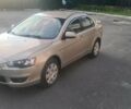 Бежевий Міцубісі Lancer, об'ємом двигуна 1.5 л та пробігом 145 тис. км за 7100 $, фото 1 на Automoto.ua