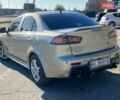 Бежевий Міцубісі Lancer, об'ємом двигуна 1.5 л та пробігом 240 тис. км за 7500 $, фото 1 на Automoto.ua