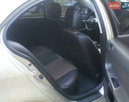 Бежевий Міцубісі Lancer, об'ємом двигуна 1.5 л та пробігом 240 тис. км за 6800 $, фото 10 на Automoto.ua