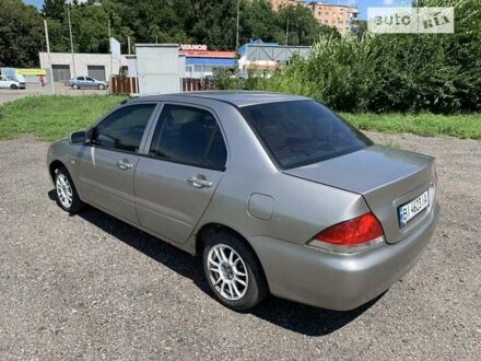 Бежевий Міцубісі Lancer, об'ємом двигуна 0 л та пробігом 200 тис. км за 3390 $, фото 1 на Automoto.ua