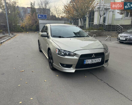 Бежевий Міцубісі Lancer, об'ємом двигуна 2 л та пробігом 238 тис. км за 5500 $, фото 1 на Automoto.ua