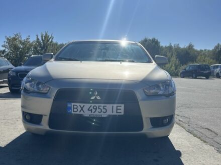 Бежевий Міцубісі Lancer, об'ємом двигуна 2 л та пробігом 138 тис. км за 7500 $, фото 1 на Automoto.ua