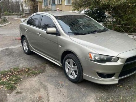 Бежевый Мицубиси Лансер, объемом двигателя 2 л и пробегом 290 тыс. км за 6000 $, фото 1 на Automoto.ua