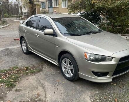 Бежевий Міцубісі Lancer, об'ємом двигуна 2 л та пробігом 290 тис. км за 6000 $, фото 1 на Automoto.ua