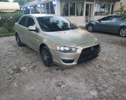 Бежевий Міцубісі Lancer, об'ємом двигуна 1.5 л та пробігом 240 тис. км за 4750 $, фото 1 на Automoto.ua