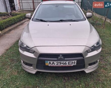 Бежевый Мицубиси Лансер, объемом двигателя 2 л и пробегом 160 тыс. км за 7500 $, фото 1 на Automoto.ua