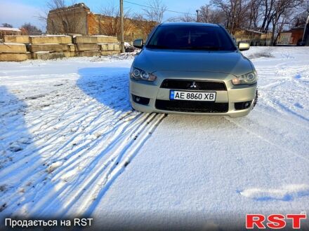 Бежевий Міцубісі Lancer, об'ємом двигуна 2 л та пробігом 230 тис. км за 6700 $, фото 1 на Automoto.ua