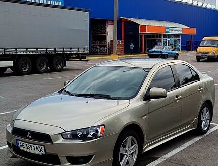 Бежевий Міцубісі Lancer, об'ємом двигуна 1.5 л та пробігом 220 тис. км за 6350 $, фото 1 на Automoto.ua