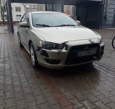 Бежевый Мицубиси Лансер, объемом двигателя 2 л и пробегом 200 тыс. км за 6500 $, фото 1 на Automoto.ua