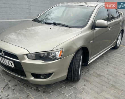 Бежевий Міцубісі Lancer, об'ємом двигуна 2 л та пробігом 230 тис. км за 5599 $, фото 1 на Automoto.ua