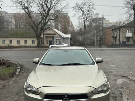 Бежевий Міцубісі Lancer, об'ємом двигуна 2 л та пробігом 270 тис. км за 4950 $, фото 1 на Automoto.ua