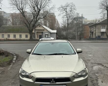 Бежевый Мицубиси Лансер, объемом двигателя 2 л и пробегом 270 тыс. км за 4950 $, фото 1 на Automoto.ua