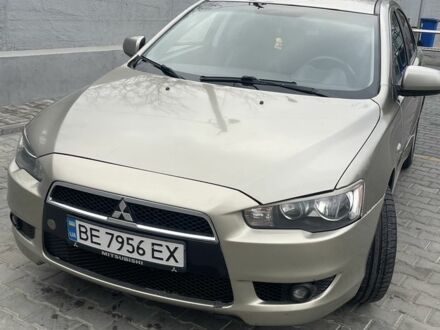 Бежевий Міцубісі Lancer, об'ємом двигуна 2 л та пробігом 230 тис. км за 5799 $, фото 1 на Automoto.ua