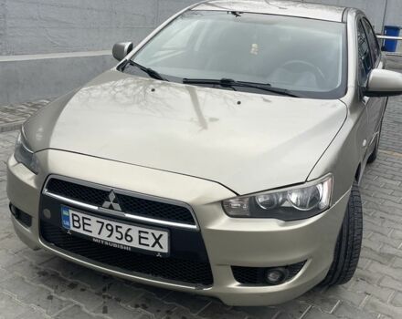 Бежевий Міцубісі Lancer, об'ємом двигуна 2 л та пробігом 230 тис. км за 5799 $, фото 1 на Automoto.ua